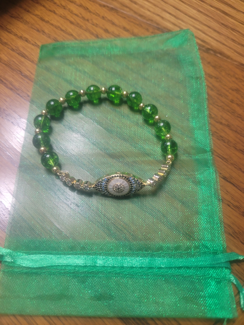 Natural Peridot Green Beaded Evil Eye Stretch Bracelet - Gold Accent